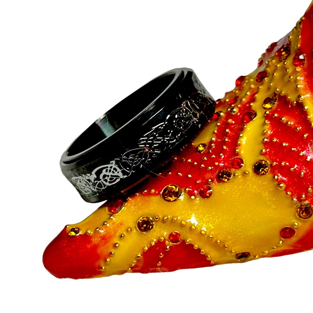 Men’s spinner ring with Celtic symbols